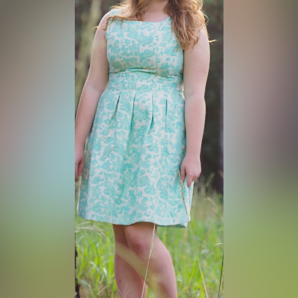 Teal and gold accent dress